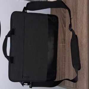 Black and gray Dell laptop bag